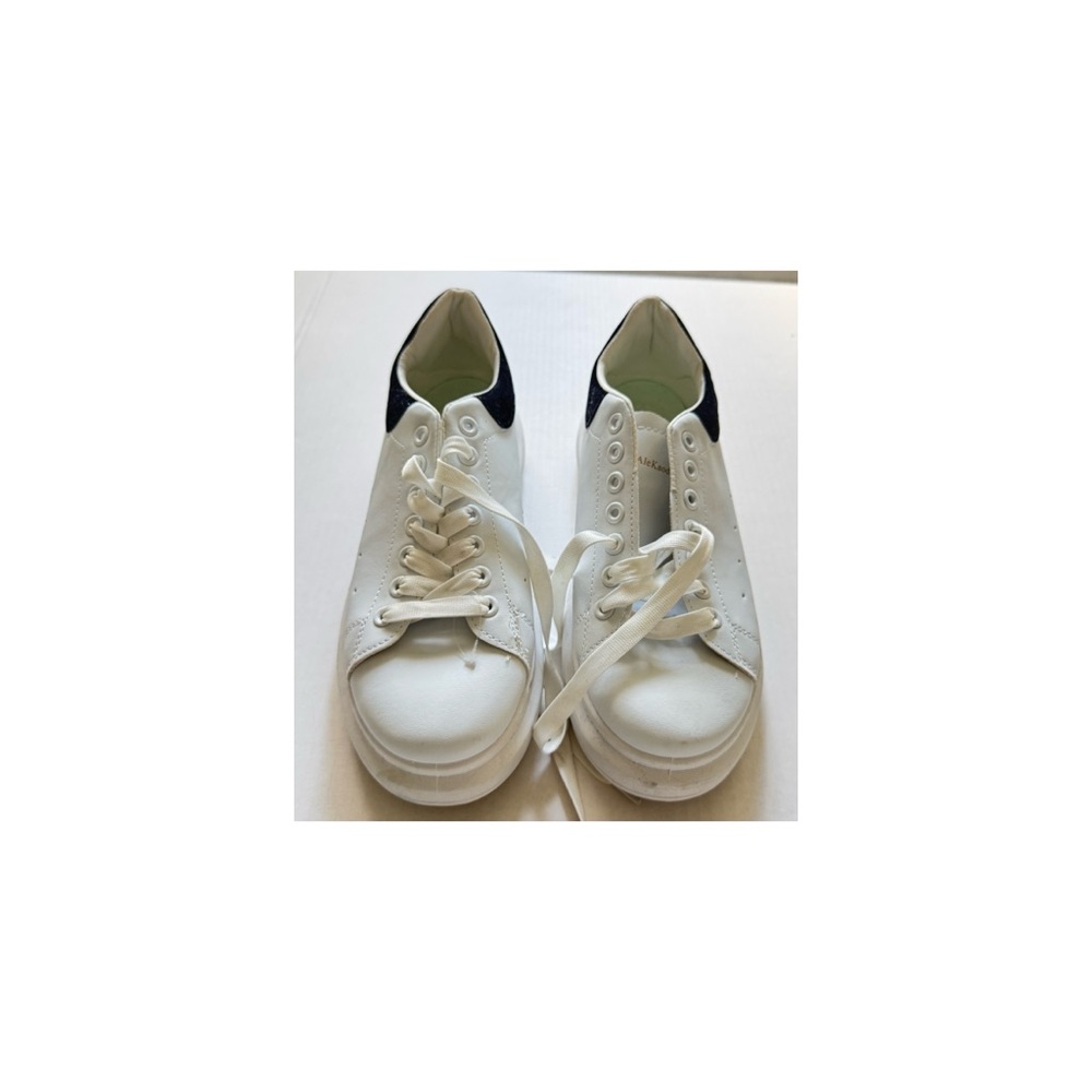 White Sneakers with Black Accents